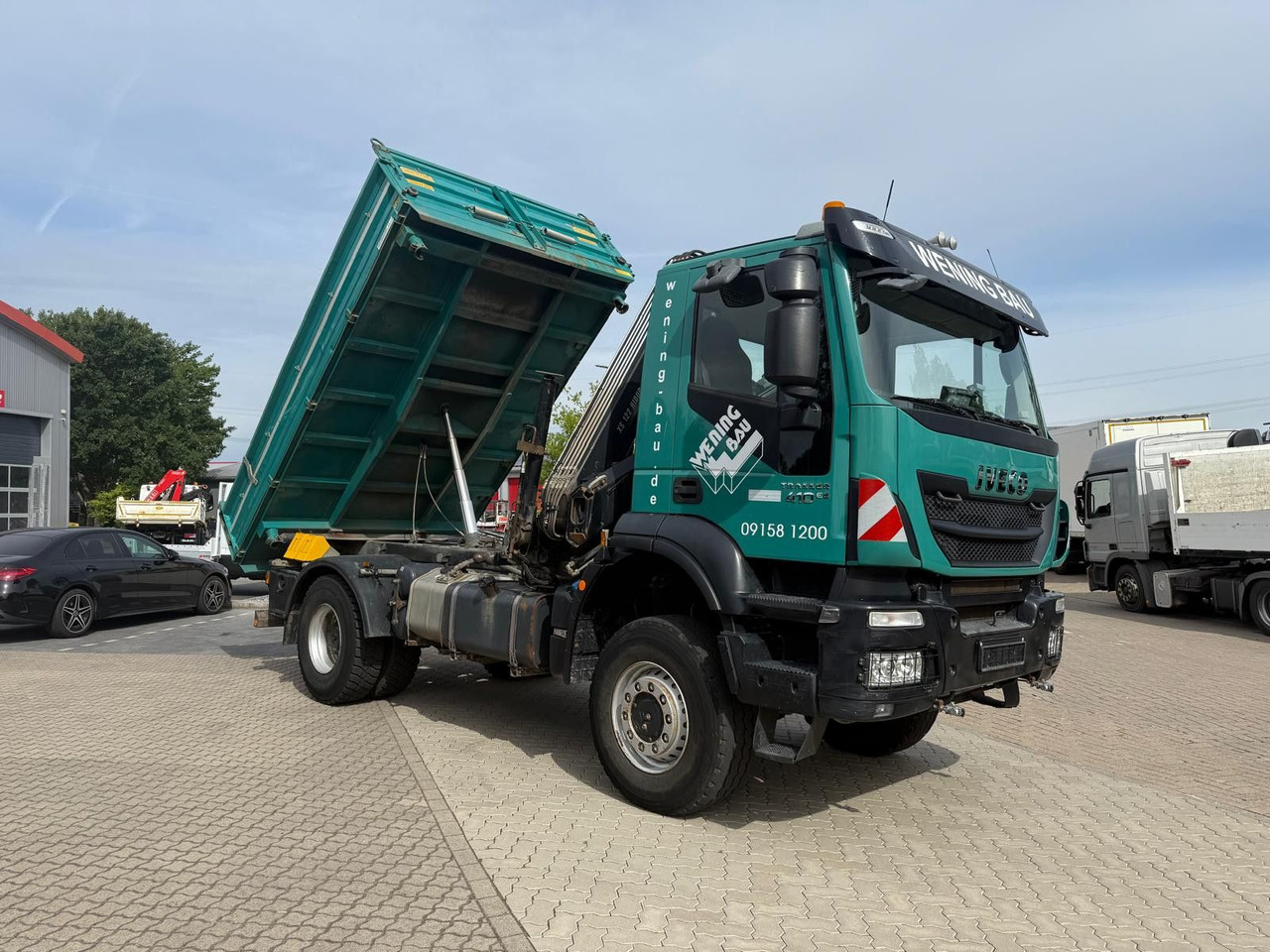 Iveco AD190 T/W Trakker 410 4x4 Allrad Kran KipperHIAB - Billenőplatós teherautó, Darus autó: 2 kép. Iveco AD190 T/W Trakker 410 4x4 Allrad Kran KipperHIAB - Billenőplatós teherautó, Darus autó: 2 kép.
