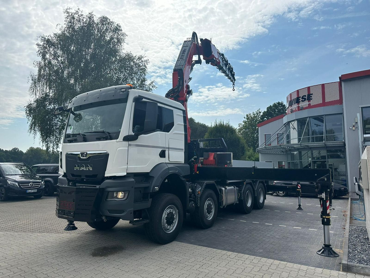 MAN TGS 41.520 8x8 mit Fassi Ladekran F710RA.2.26 - Darus autó: 2 kép. MAN TGS 41.520 8x8 mit Fassi Ladekran F710RA.2.26 - Darus autó: 2 kép.