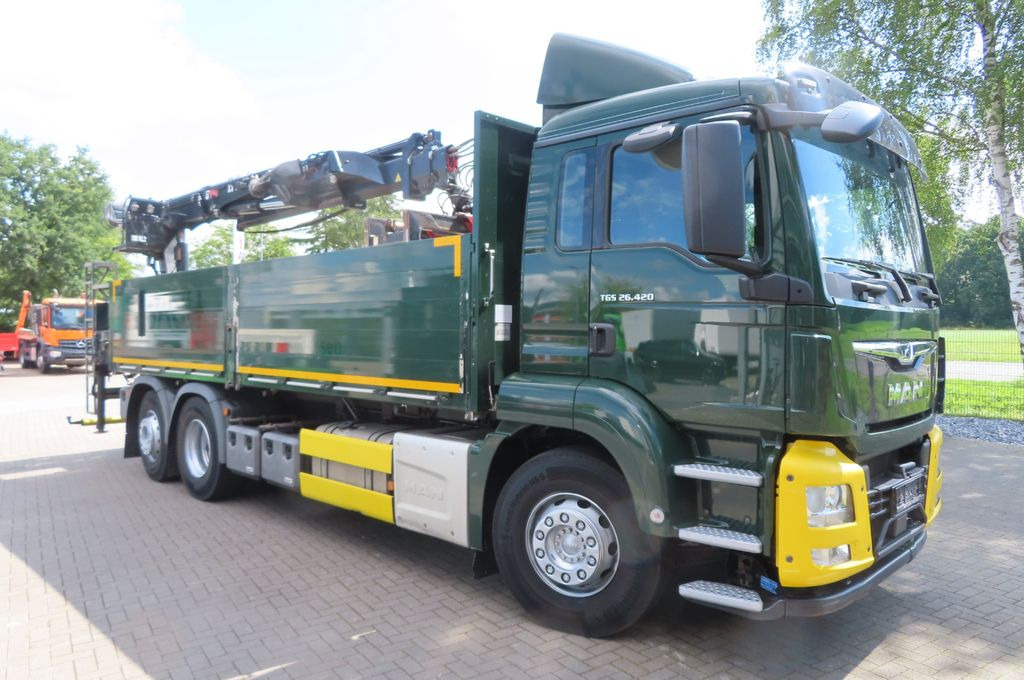 MAN TGX 26.500 6x2 - Baustoff - HIAB Kran - Platós teherautó, Darus autó: 2 kép. MAN TGX 26.500 6x2 - Baustoff - HIAB Kran - Platós teherautó, Darus autó: 2 kép.