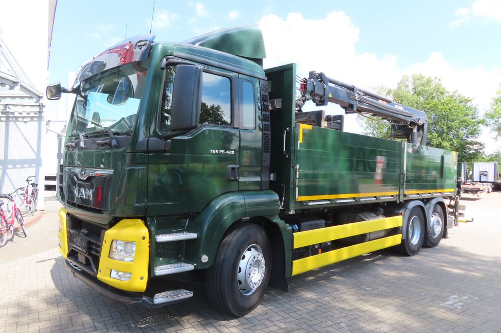 MAN TGX 26.500 6x2 - Baustoff - Kran HIAB - Darus autó, Platós teherautó: 3 kép. MAN TGX 26.500 6x2 - Baustoff - Kran HIAB - Darus autó, Platós teherautó: 3 kép.