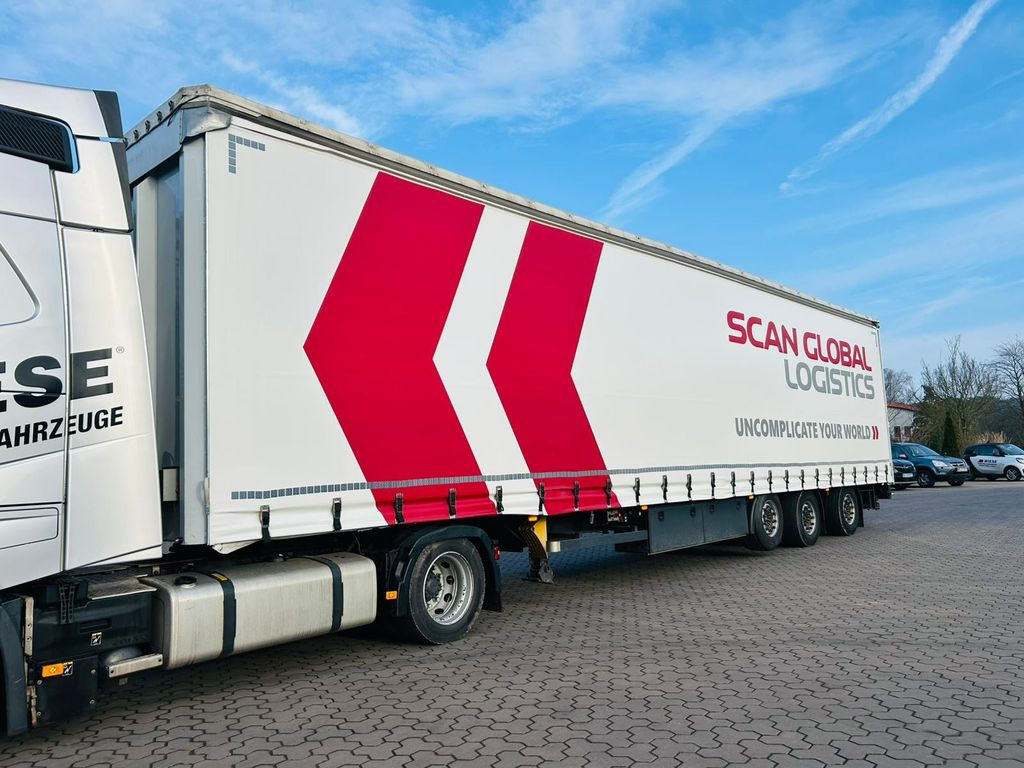 Mega Gabelstaplertransporter Ladebordwand9t Mega Gabelstaplertransporter Ladebordwand9t - Platós félpótkocsi: 3 kép. Mega Gabelstaplertransporter Ladebordwand9t Mega Gabelstaplertransporter Ladebordwand9t - Platós félpótkocsi: 3 kép.