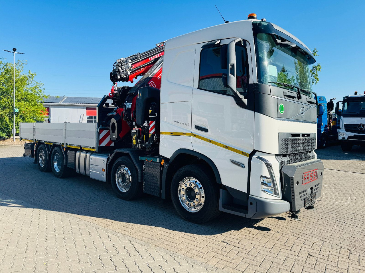 Volvo FH 500 8x2 mit F710RA.2.27 L426 und V20 Winde - Teherautó, Darus autó: 2 kép. Volvo FH 500 8x2 mit F710RA.2.27 L426 und V20 Winde - Teherautó, Darus autó: 2 kép.