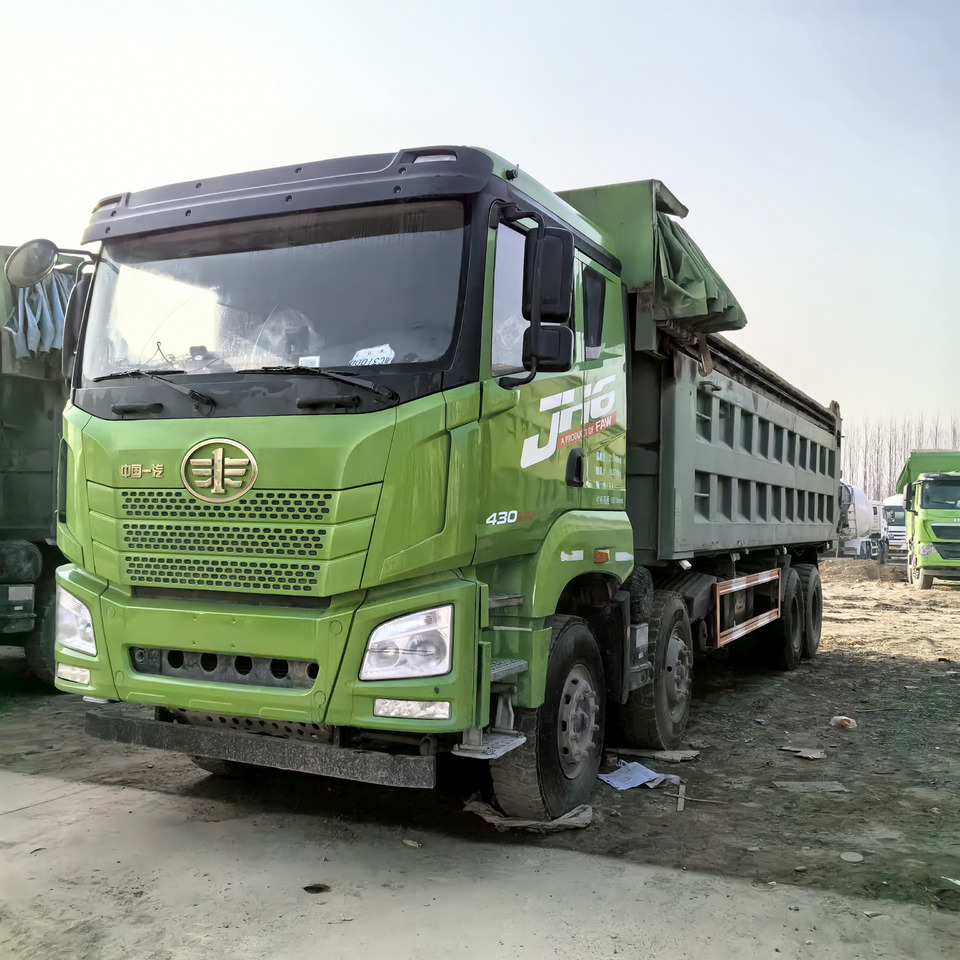 FAW China 8x4 430hp-Green Tipper - Billenőplatós teherautó: 1 kép. FAW China 8x4 430hp-Green Tipper - Billenőplatós teherautó: 1 kép.