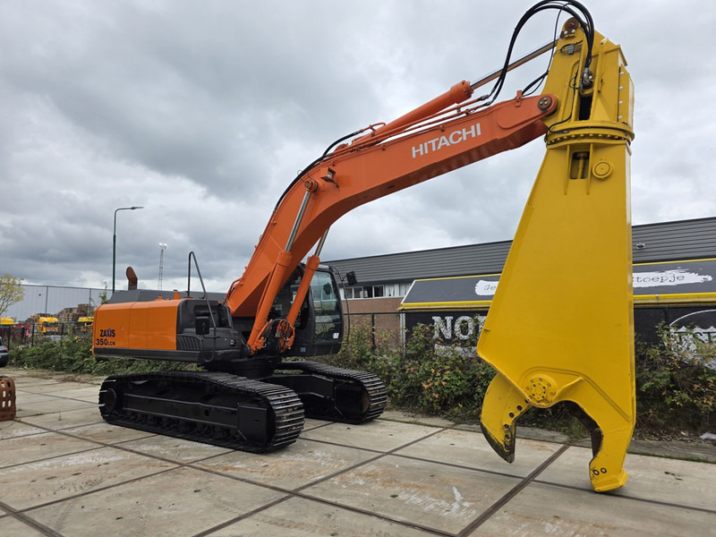 Hitachi zx350lcn-5B labounty scrap shear hitachi zx 350 genesis labounty fortress - Hulladék kotró: 2 kép. Hitachi zx350lcn-5B labounty scrap shear hitachi zx 350 genesis labounty fortress - Hulladék kotró: 2 kép.