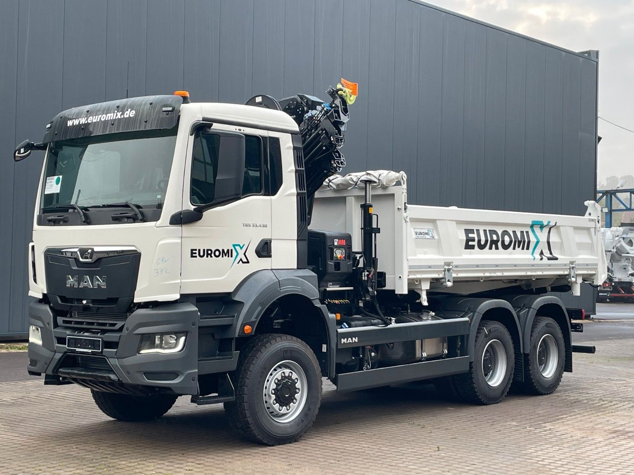 MAN TGS 33.440 6x6 /3-Seiten- Kipper / HIAB 228-6 - Billenőplatós teherautó, Darus autó: 3 kép. MAN TGS 33.440 6x6 /3-Seiten- Kipper / HIAB 228-6 - Billenőplatós teherautó, Darus autó: 3 kép.