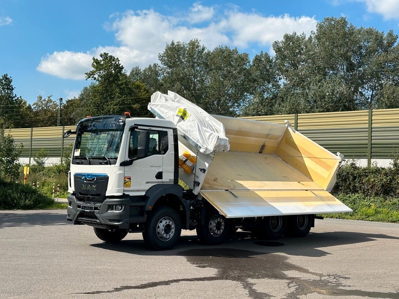 MAN TGS 41.440 8x4 EuromixMTP 3-Seiten-Kipper - Billenőplatós teherautó: 1 kép. MAN TGS 41.440 8x4 EuromixMTP 3-Seiten-Kipper - Billenőplatós teherautó: 1 kép.