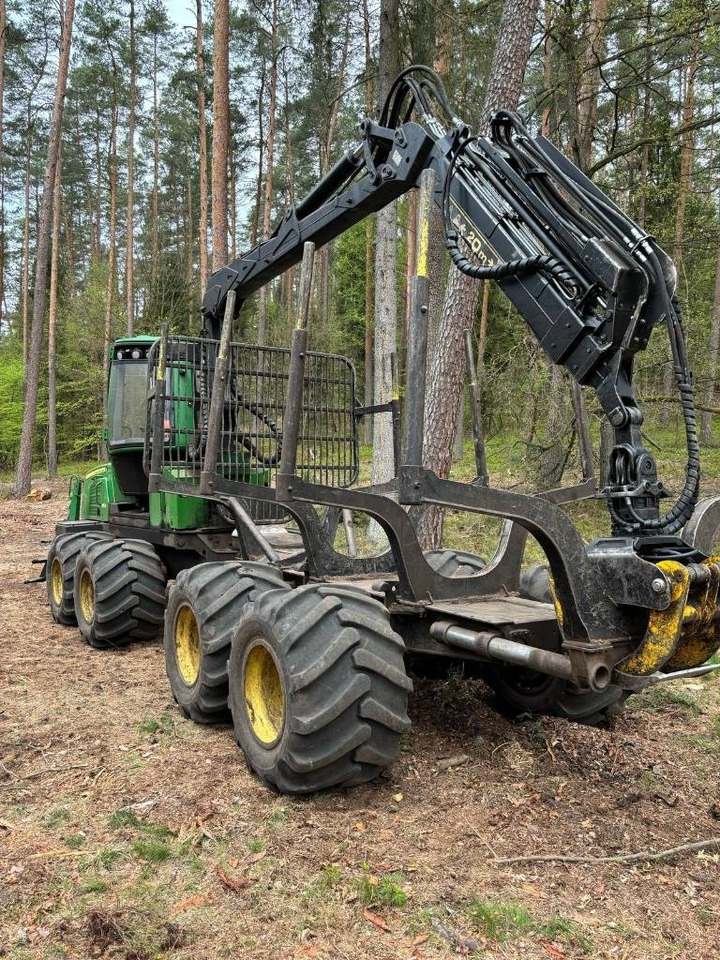 John Deere 810 E - Kihordó: 5 kép. John Deere 810 E - Kihordó: 5 kép.