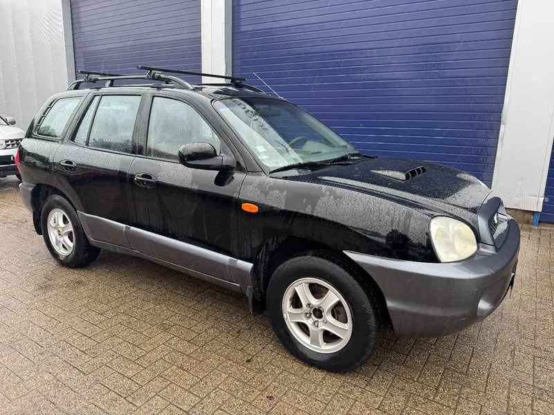 Hyundai Santa Fe **2.0CRDI-4WD-AIRCO-CLIME** - Terepjáró/ SUV: 3 kép. Hyundai Santa Fe **2.0CRDI-4WD-AIRCO-CLIME** - Terepjáró/ SUV: 3 kép.