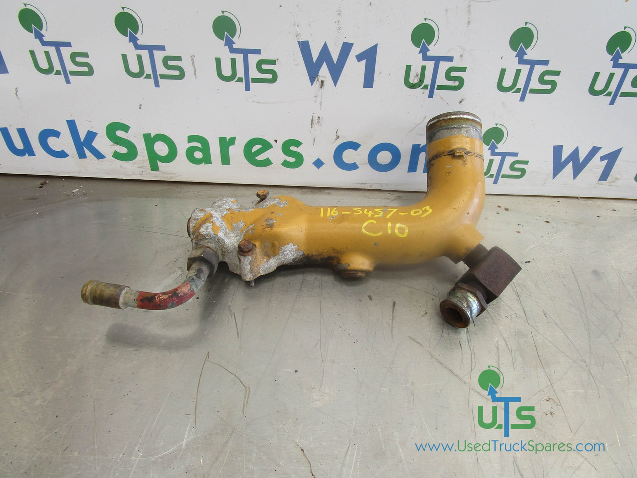 CAT C10 / C12 WATER PUMP PIPE P/NO 116-5457-03 - Motor és alkatrészek - Teherautó: 1 kép. CAT C10 / C12 WATER PUMP PIPE P/NO 116-5457-03 - Motor és alkatrészek - Teherautó: 1 kép.