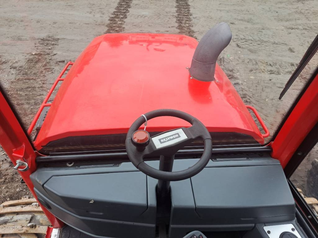 Komatsu 855 - Kihordó: 2 kép. Komatsu 855 - Kihordó: 2 kép.