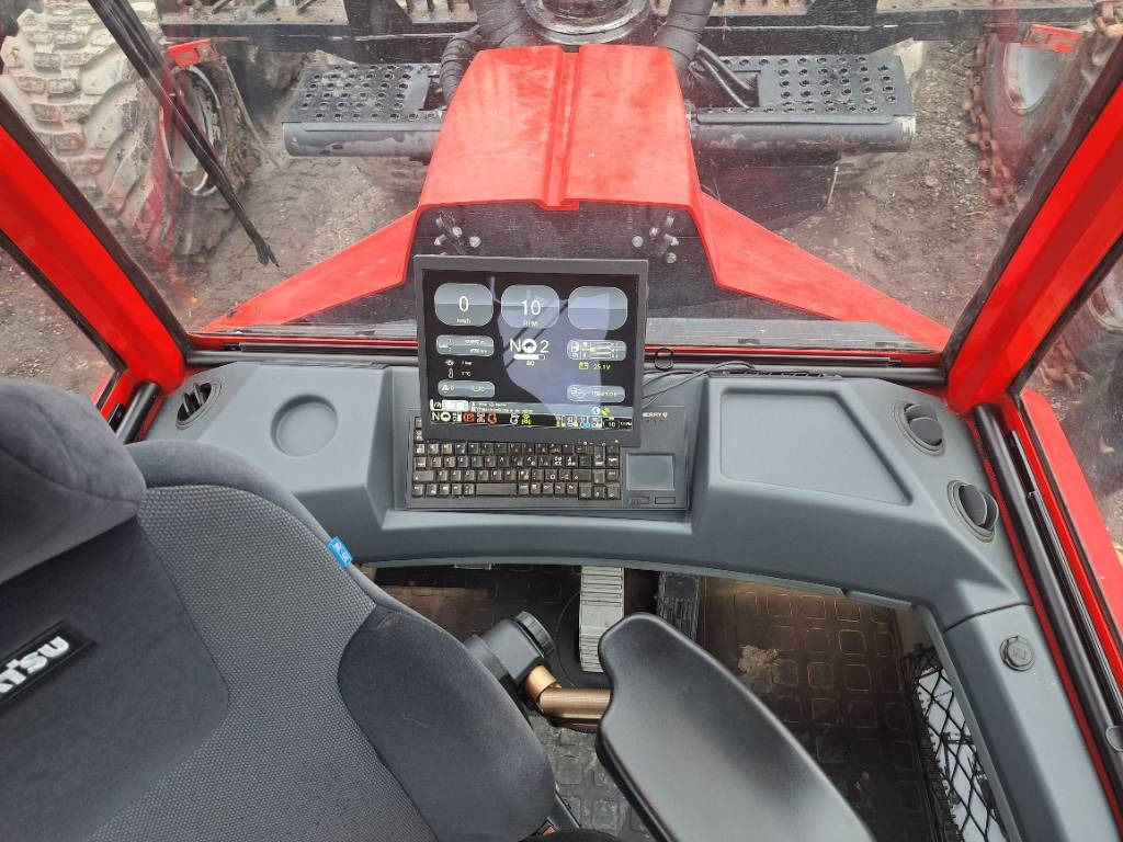 Komatsu 855 - Kihordó: 3 kép. Komatsu 855 - Kihordó: 3 kép.