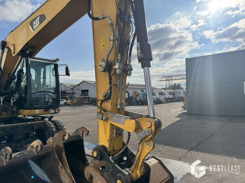 Caterpillar M313D - Gumikerekes kotró: 5 kép. Caterpillar M313D - Gumikerekes kotró: 5 kép.