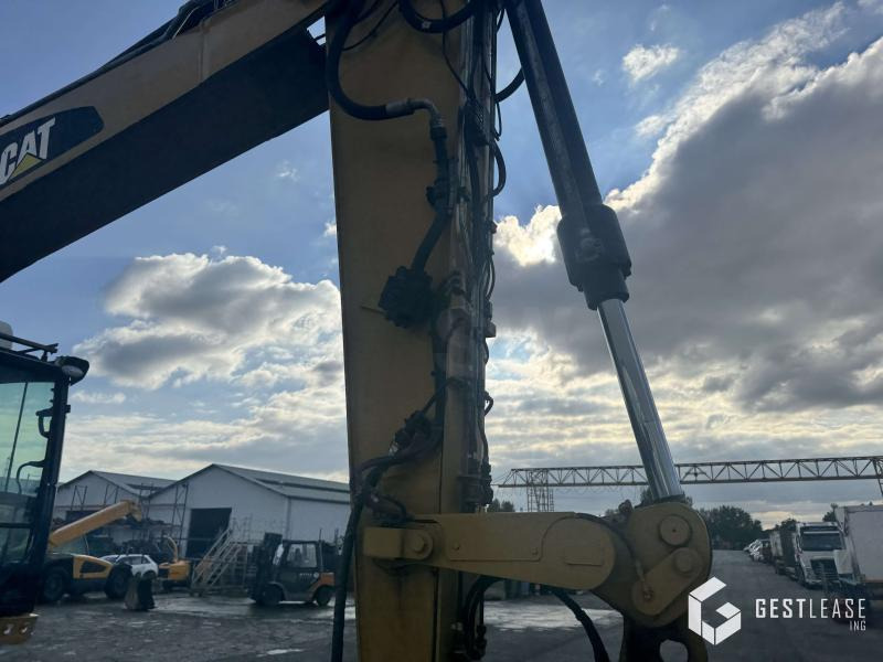 Caterpillar M315F - Gumikerekes kotró: 5 kép. Caterpillar M315F - Gumikerekes kotró: 5 kép.