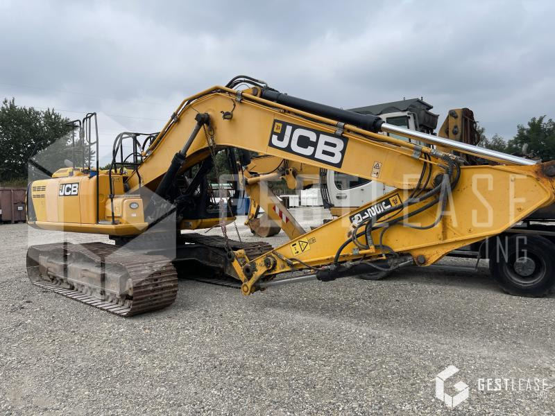 JCB JS210 - Lánctalpas kotró: 2 kép. JCB JS210 - Lánctalpas kotró: 2 kép.