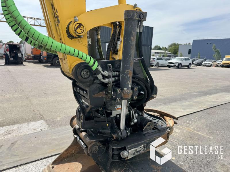 Gumikerekes kotró Komatsu PW148-11: 8 kép.