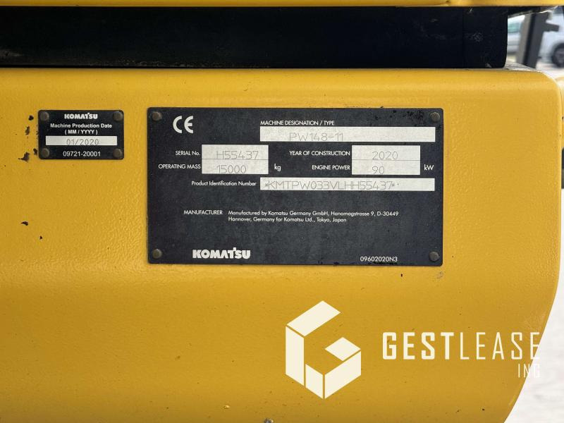 Gumikerekes kotró Komatsu PW148-11: 10 kép.