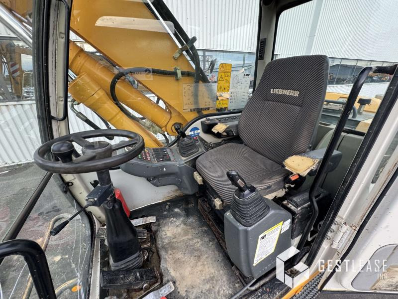 Gumikerekes kotró Liebherr A312 Litronic: 17 kép. Gumikerekes kotró Liebherr A312 Litronic: 17 kép.