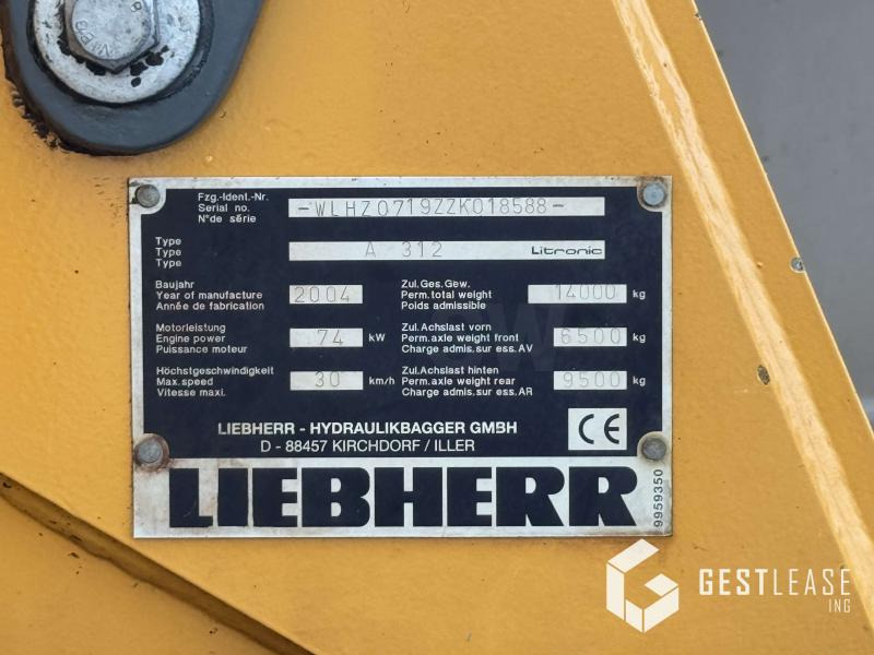 Gumikerekes kotró Liebherr A312 Litronic: 13 kép. Gumikerekes kotró Liebherr A312 Litronic: 13 kép.