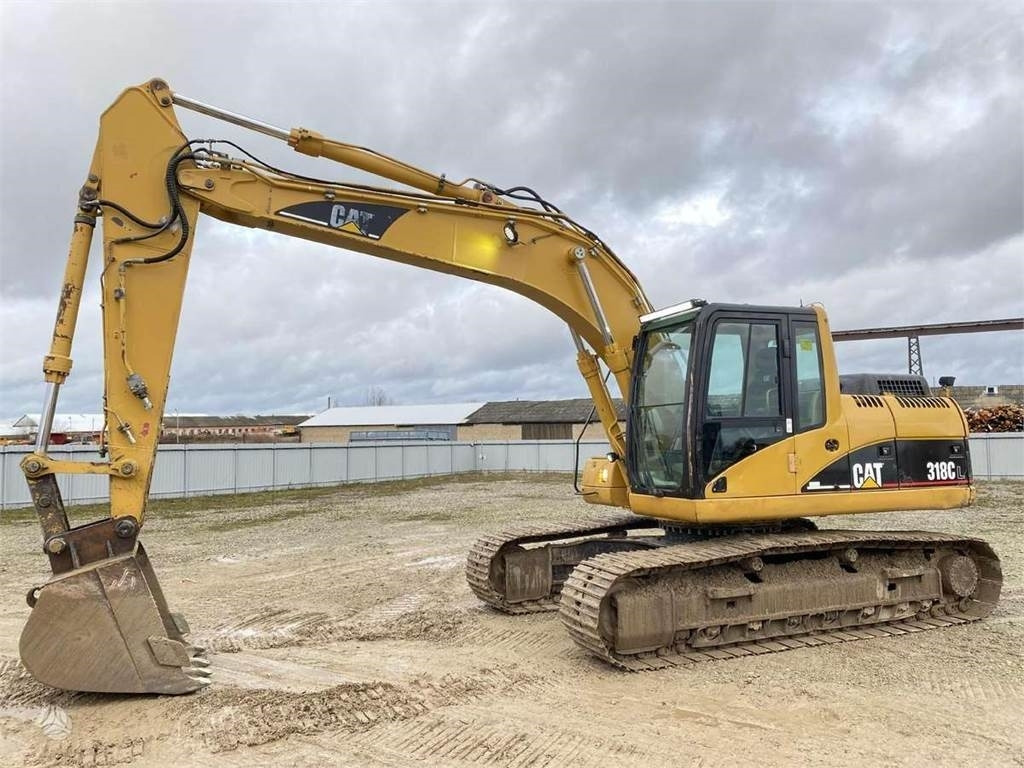 CAT 318 CL - Lánctalpas kotró: 2 kép. CAT 318 CL - Lánctalpas kotró: 2 kép.