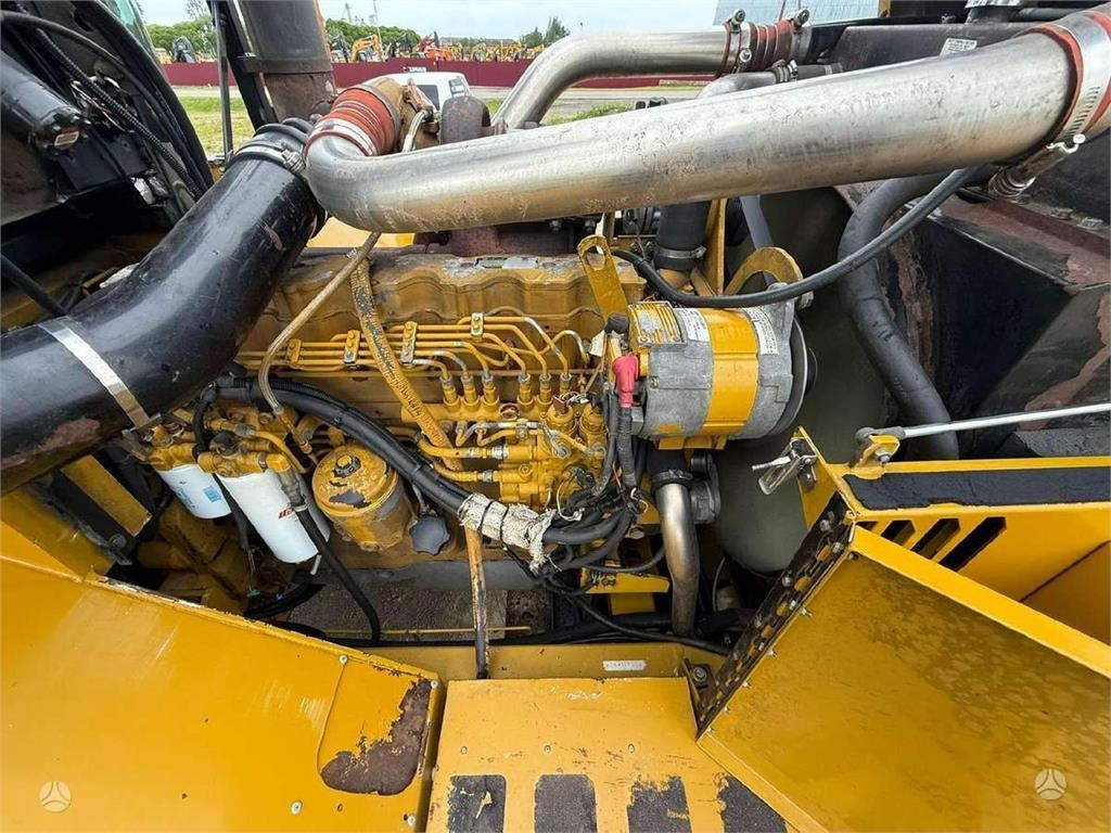 Csuklós dömper CAT TerraGator 2104 CE&EPA: 13 kép. Csuklós dömper CAT TerraGator 2104 CE&EPA: 13 kép.