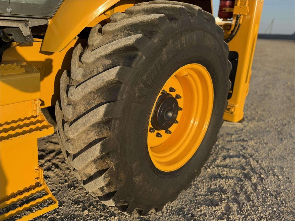 Kotrórakodó Volvo BL 71: 23 kép. Kotrórakodó Volvo BL 71: 23 kép.