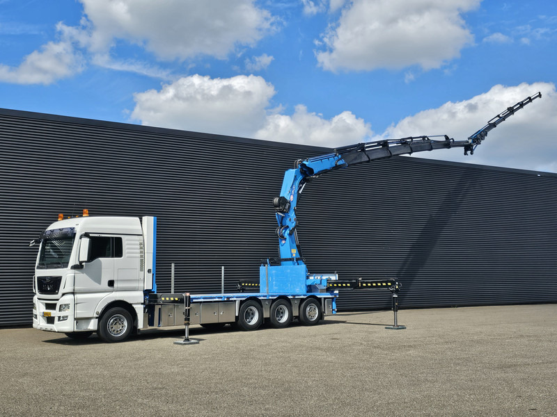 MAN TGX 35.480 8x4-4 / HMF 85 t/m + JIB / WINCH - Platós teherautó, Darus autó: 1 kép. MAN TGX 35.480 8x4-4 / HMF 85 t/m + JIB / WINCH - Platós teherautó, Darus autó: 1 kép.