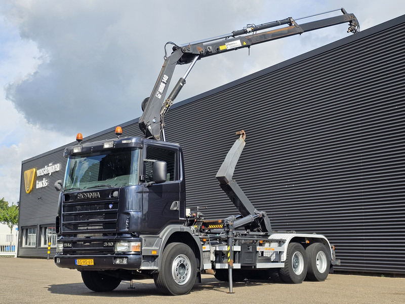 Scania R114.340 6x2 / HIAB CRANE + 25T HOOKLIFT - Horgos rakodó teherautó, Darus autó: 1 kép. Scania R114.340 6x2 / HIAB CRANE + 25T HOOKLIFT - Horgos rakodó teherautó, Darus autó: 1 kép.
