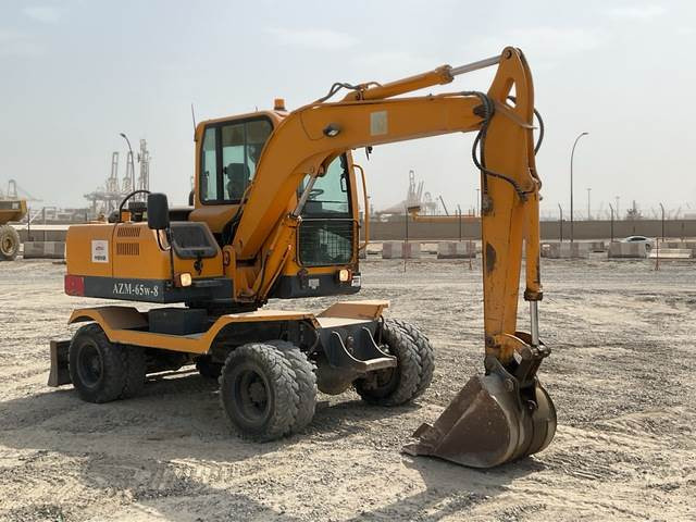 Ascesco AZM-65W-8 - Gumikerekes kotró: 4 kép. Ascesco AZM-65W-8 - Gumikerekes kotró: 4 kép.