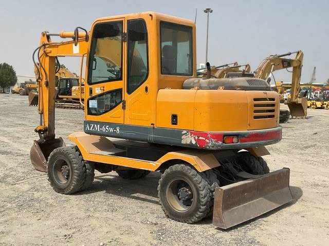Ascesco AZM-65W-8 - Gumikerekes kotró: 2 kép. Ascesco AZM-65W-8 - Gumikerekes kotró: 2 kép.