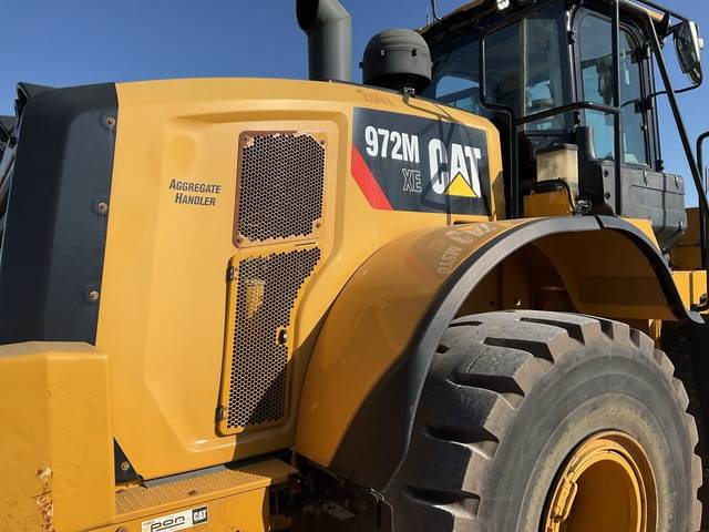 Gumikerekes homlokrakodó CAT 972M XE: 10 kép.