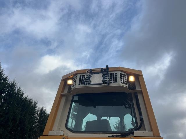 Buldózer Liebherr PR724L: 23 kép. Buldózer Liebherr PR724L: 23 kép.