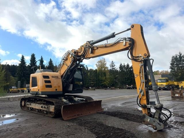 Liebherr R926 Compact - Lánctalpas kotró: 4 kép. Liebherr R926 Compact - Lánctalpas kotró: 4 kép.