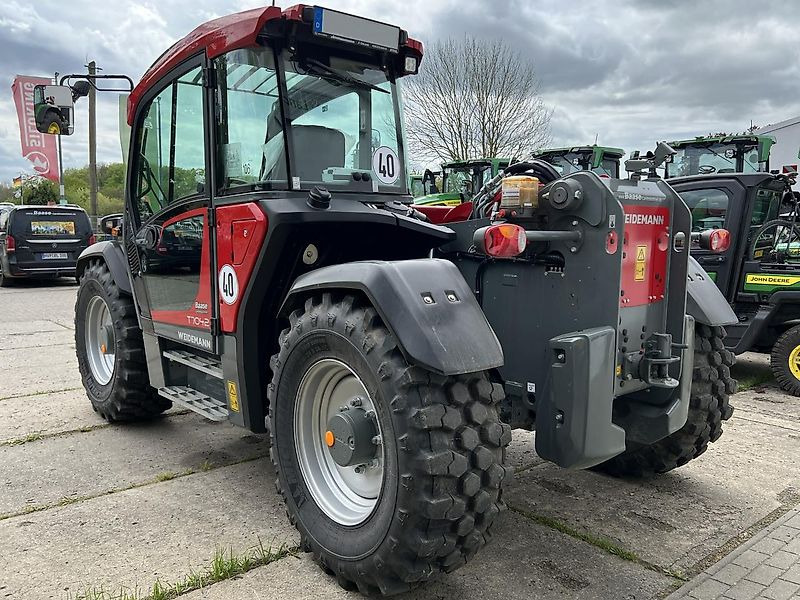 Weidemann T7042 Klima 40km Zentralschmierung - Teleszkópos rakodó: 3 kép. Weidemann T7042 Klima 40km Zentralschmierung - Teleszkópos rakodó: 3 kép.
