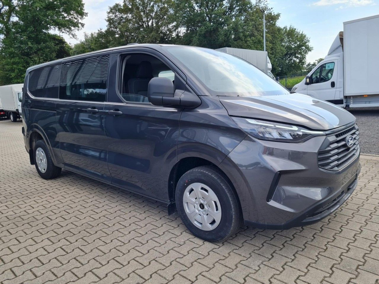 Ford Transit Custom Kasten Doka L2 Trend AHK 5 Sitze - Furgon: 3 kép. Ford Transit Custom Kasten Doka L2 Trend AHK 5 Sitze - Furgon: 3 kép.
