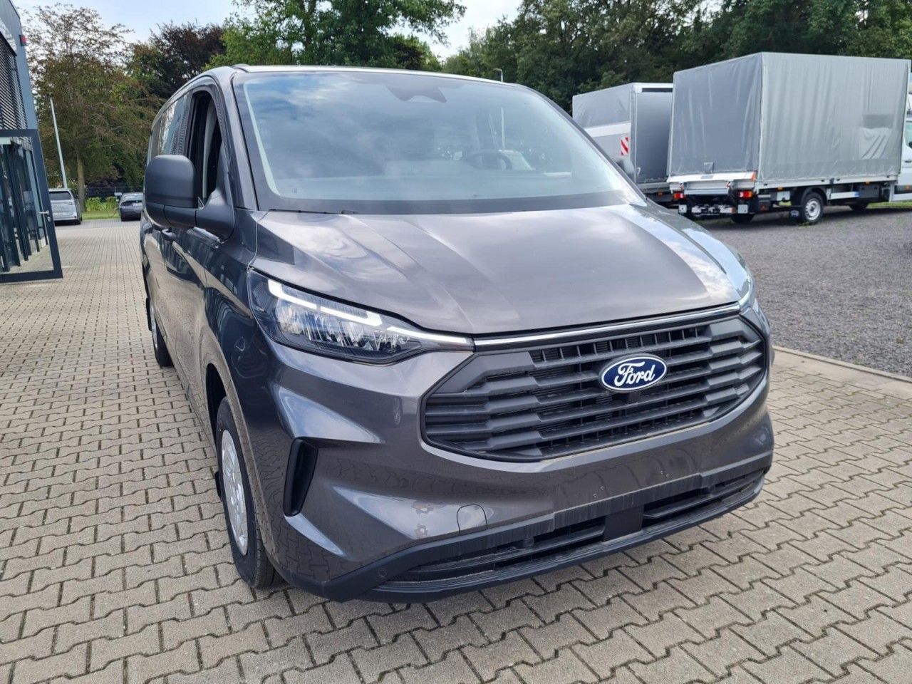 Ford Transit Custom Kasten Doka L2 Trend AHK 5 Sitze - Furgon: 2 kép. Ford Transit Custom Kasten Doka L2 Trend AHK 5 Sitze - Furgon: 2 kép.