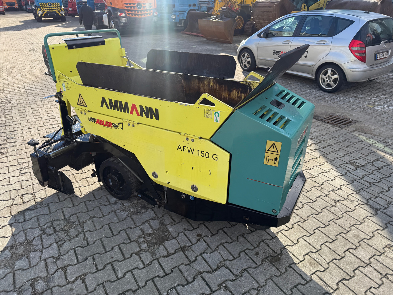 Ammann AFW 150G Gehwegfertiger - Kotrógép: 4 kép. Ammann AFW 150G Gehwegfertiger - Kotrógép: 4 kép.