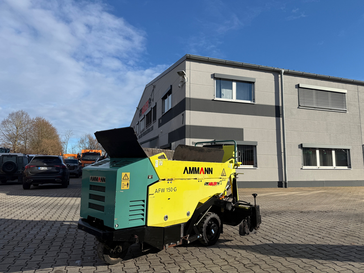 Ammann AFW 150G Gehwegfertiger - Kotrógép: 3 kép. Ammann AFW 150G Gehwegfertiger - Kotrógép: 3 kép.
