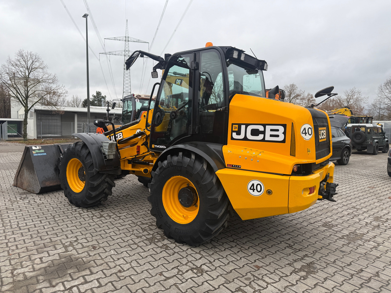JCB TM320S Teleskopradlader SW - Gumikerekes homlokrakodó: 5 kép. JCB TM320S Teleskopradlader SW - Gumikerekes homlokrakodó: 5 kép.