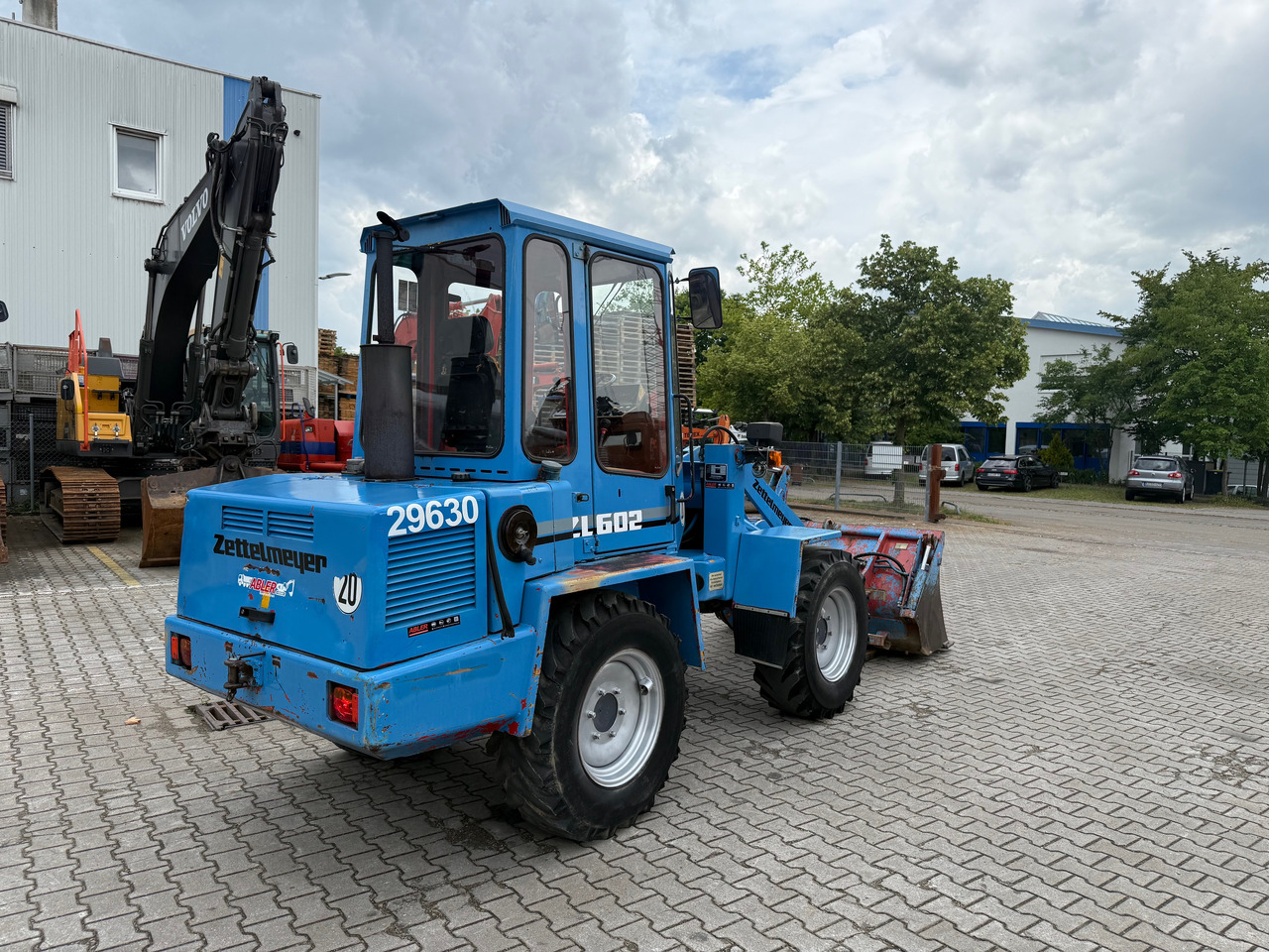 Zettelmeyer ZL502C Radlader Gabel+Klappschaufel+SW - Gumikerekes homlokrakodó: 5 kép. Zettelmeyer ZL502C Radlader Gabel+Klappschaufel+SW - Gumikerekes homlokrakodó: 5 kép.