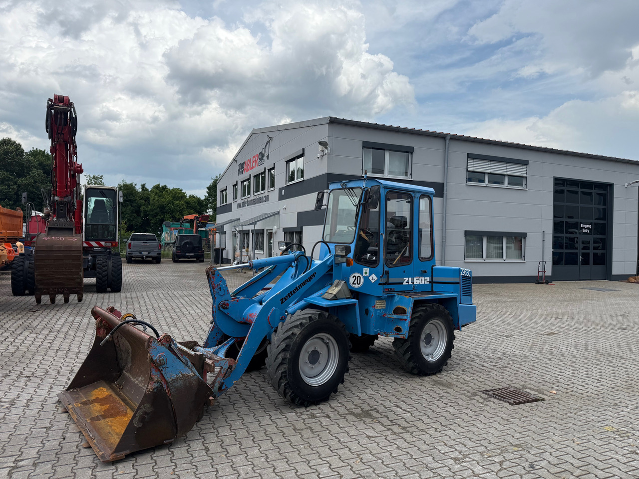 Zettlmeyer ZL602 Radlader Gabel + Schaufel + SW - Gumikerekes homlokrakodó: 2 kép. Zettlmeyer ZL602 Radlader Gabel + Schaufel + SW - Gumikerekes homlokrakodó: 2 kép.