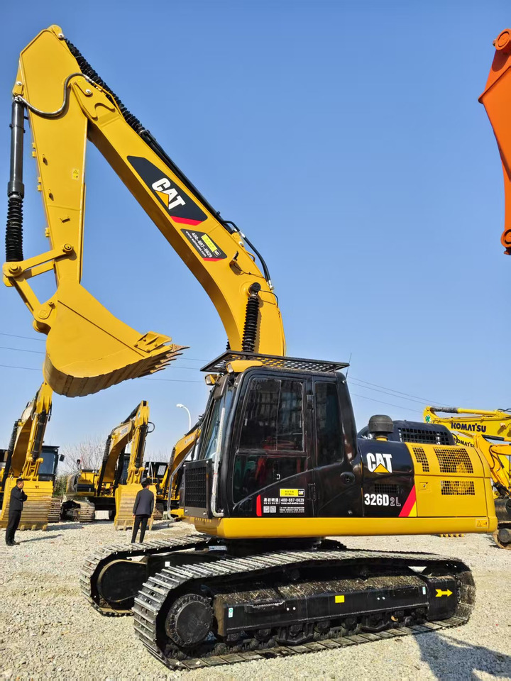 Caterpillar 326D - Lánctalpas kotró: 1 kép. Caterpillar 326D - Lánctalpas kotró: 1 kép.