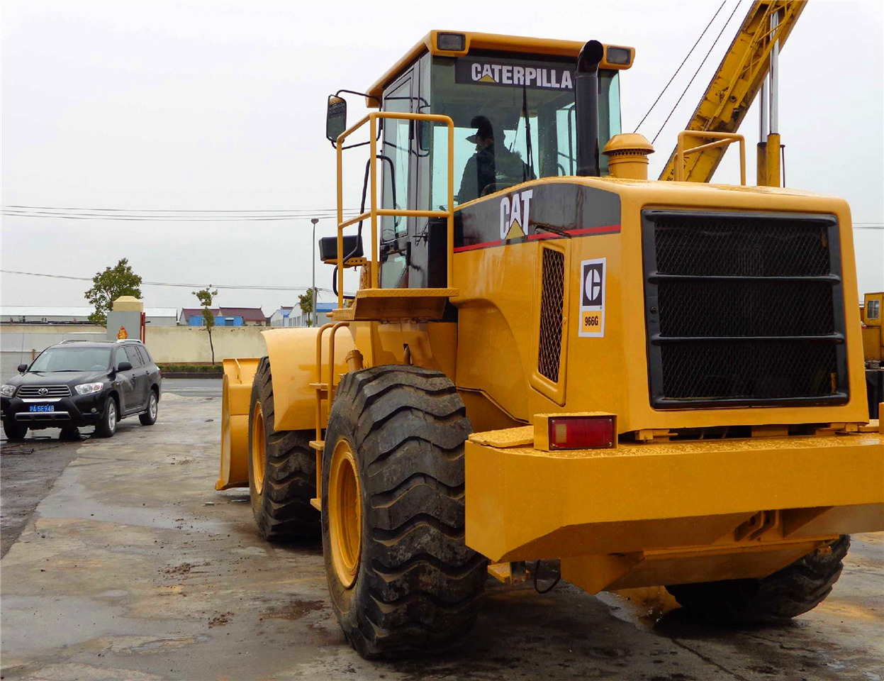 Caterpillar 966G - Gumikerekes homlokrakodó: 3 kép. Caterpillar 966G - Gumikerekes homlokrakodó: 3 kép.