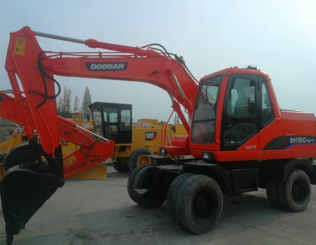 Doosan 150W-7 - Gumikerekes kotró: 1 kép. Doosan 150W-7 - Gumikerekes kotró: 1 kép.