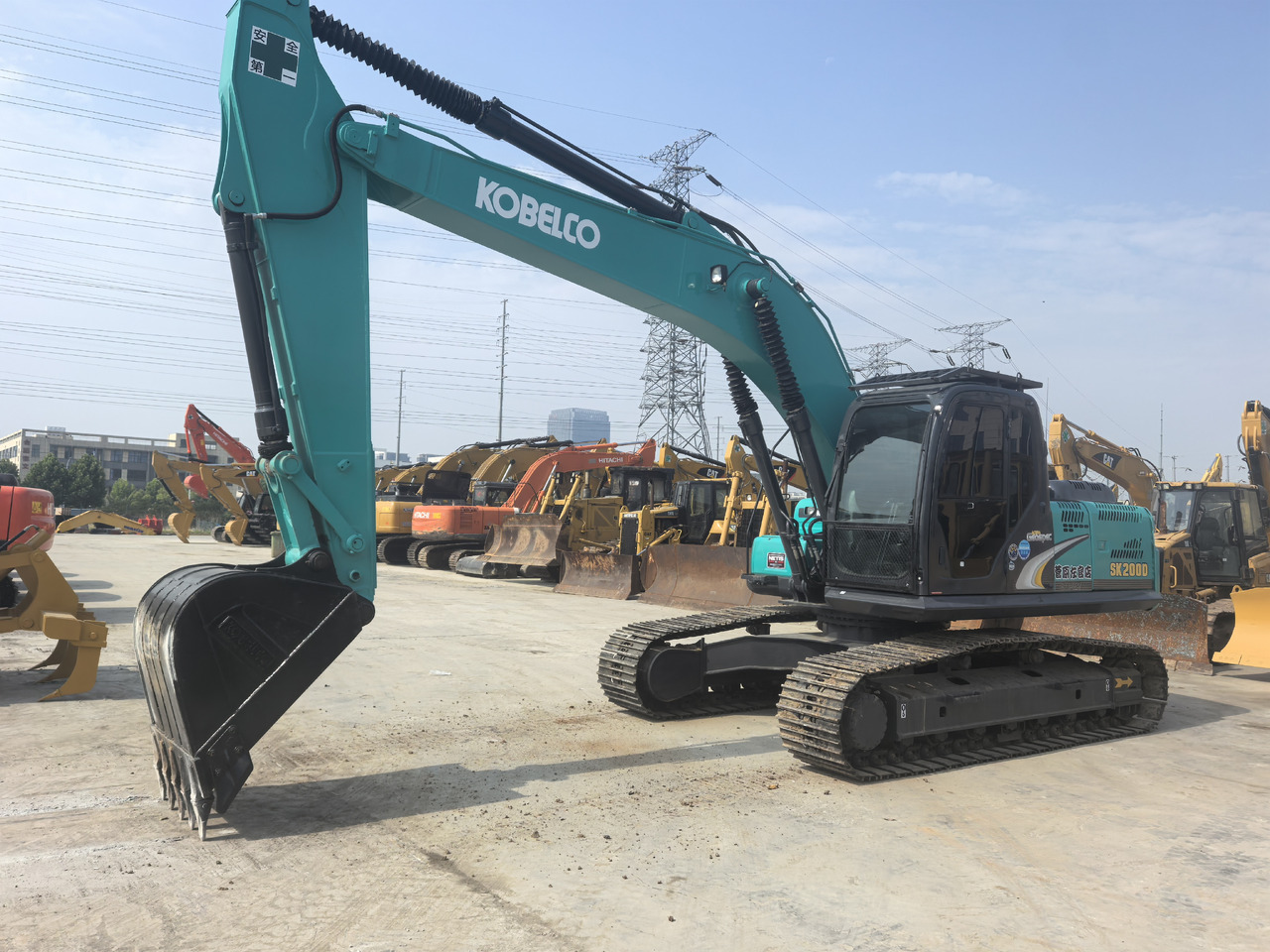 KOBELCO SK200D - Kotrógép: 1 kép. KOBELCO SK200D - Kotrógép: 1 kép.