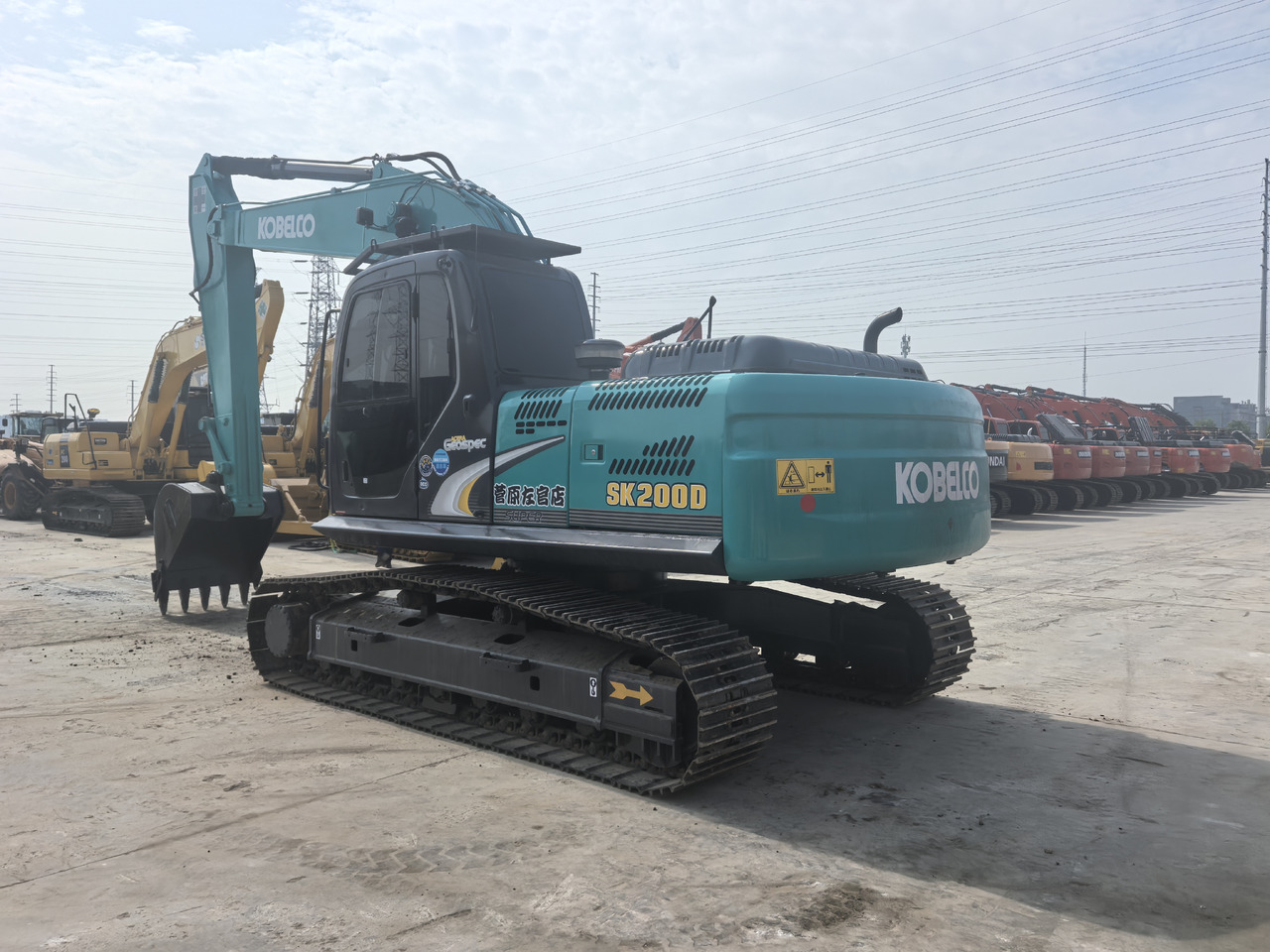 KOBELCO SK200D - Kotrógép: 3 kép. KOBELCO SK200D - Kotrógép: 3 kép.