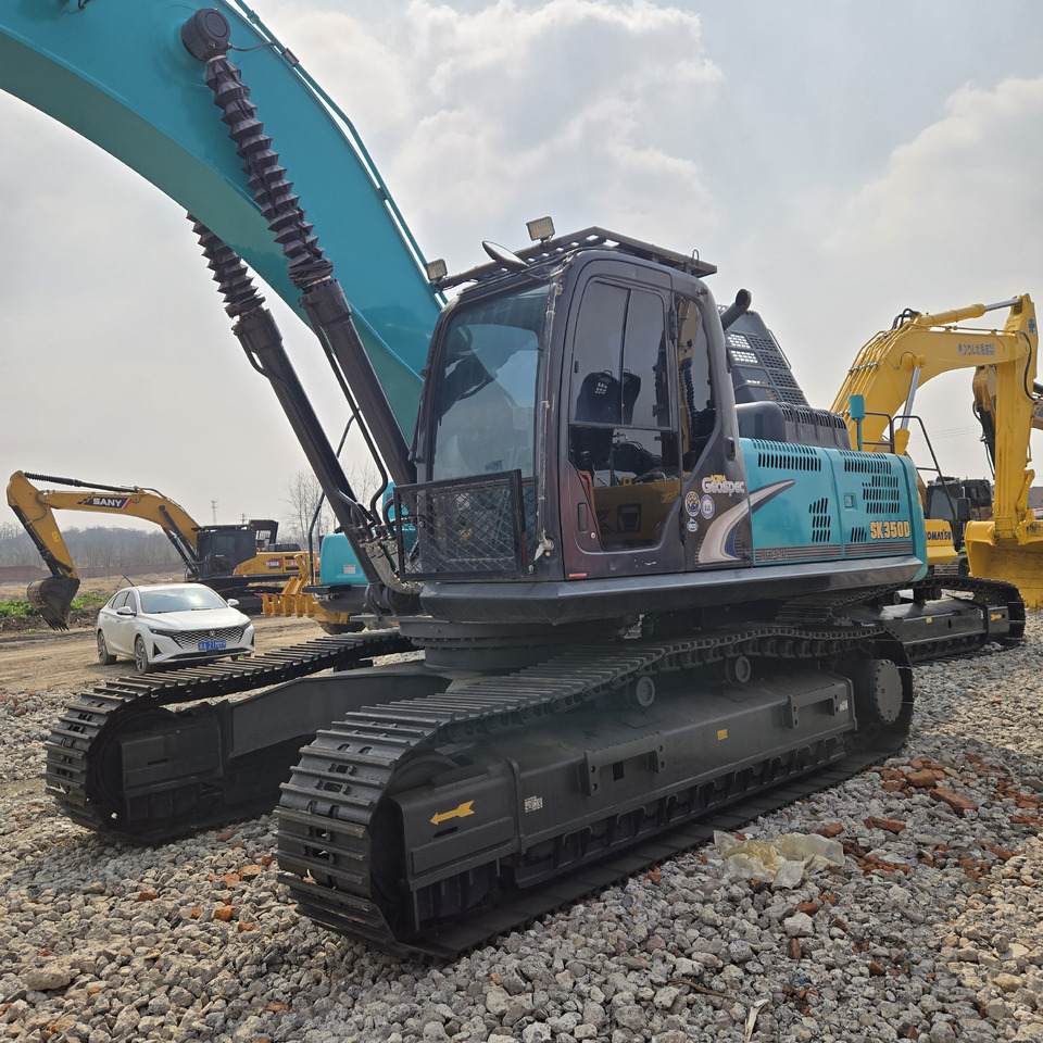KOBELCO SK350D - Kotrógép: 2 kép. KOBELCO SK350D - Kotrógép: 2 kép.
