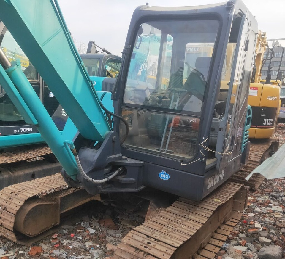 Kobelco SK60 with Swing Boom - Minikotró: 3 kép. Kobelco SK60 with Swing Boom - Minikotró: 3 kép.