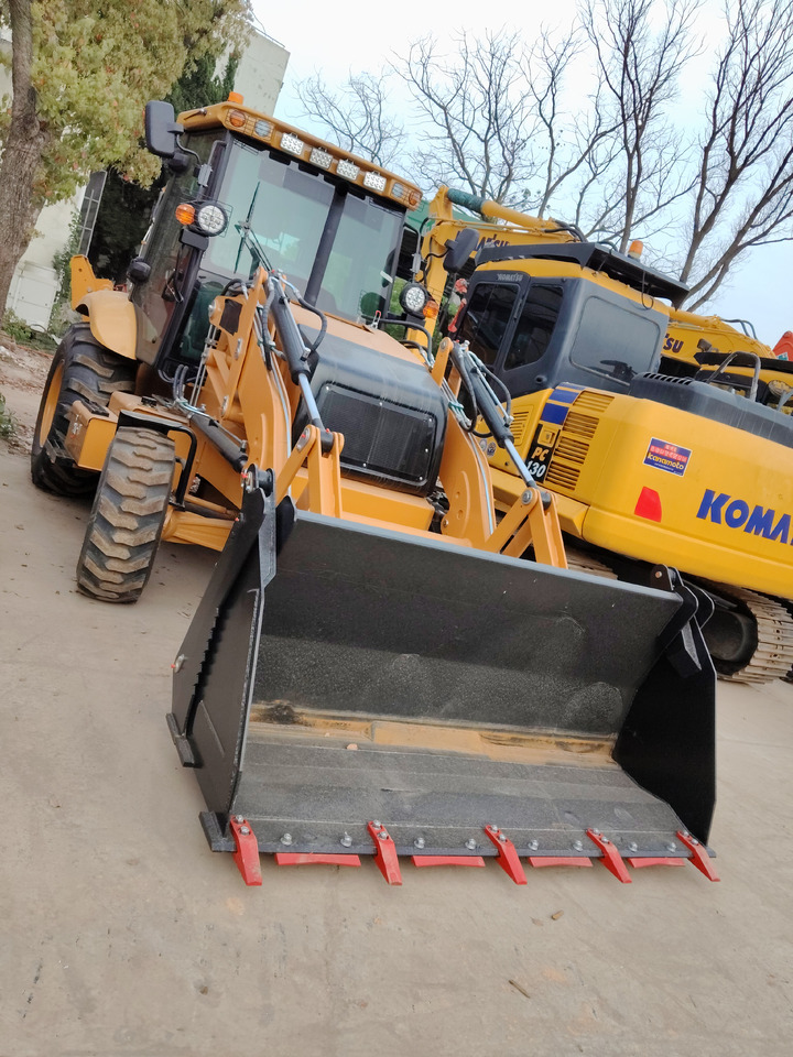 CAT 420F 100% NEW - Kotrórakodó: 2 kép. CAT 420F 100% NEW - Kotrórakodó: 2 kép.