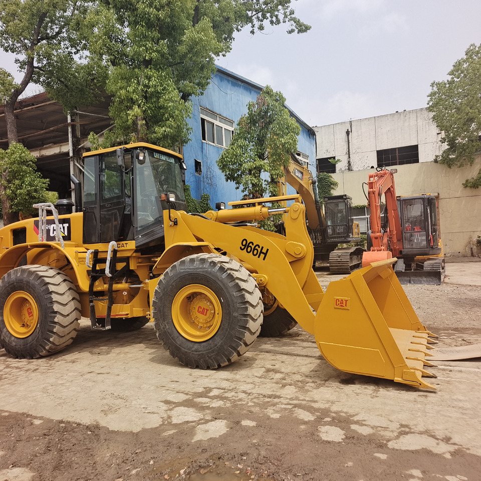 CAT 966H CATERPILLAR 966 H - Gumikerekes homlokrakodó: 2 kép. CAT 966H CATERPILLAR 966 H - Gumikerekes homlokrakodó: 2 kép.