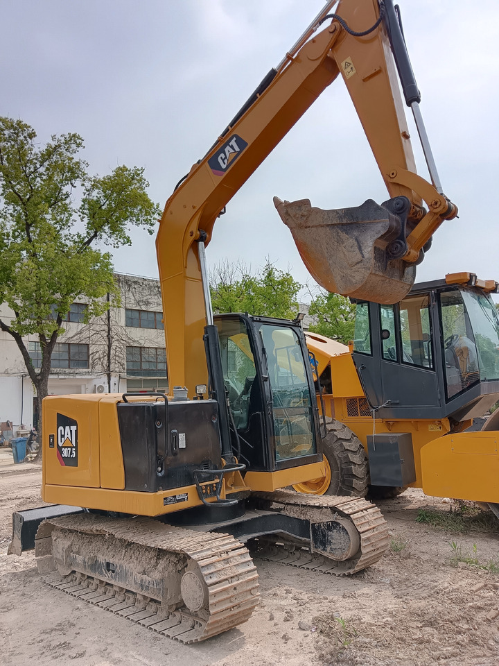 CATERPILLAR 307.5 CAT 307D 307E2 312D2GC - Minikotró: 1 kép. CATERPILLAR 307.5 CAT 307D 307E2 312D2GC - Minikotró: 1 kép.